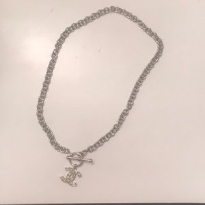 Necklace with intertwined “C” logo